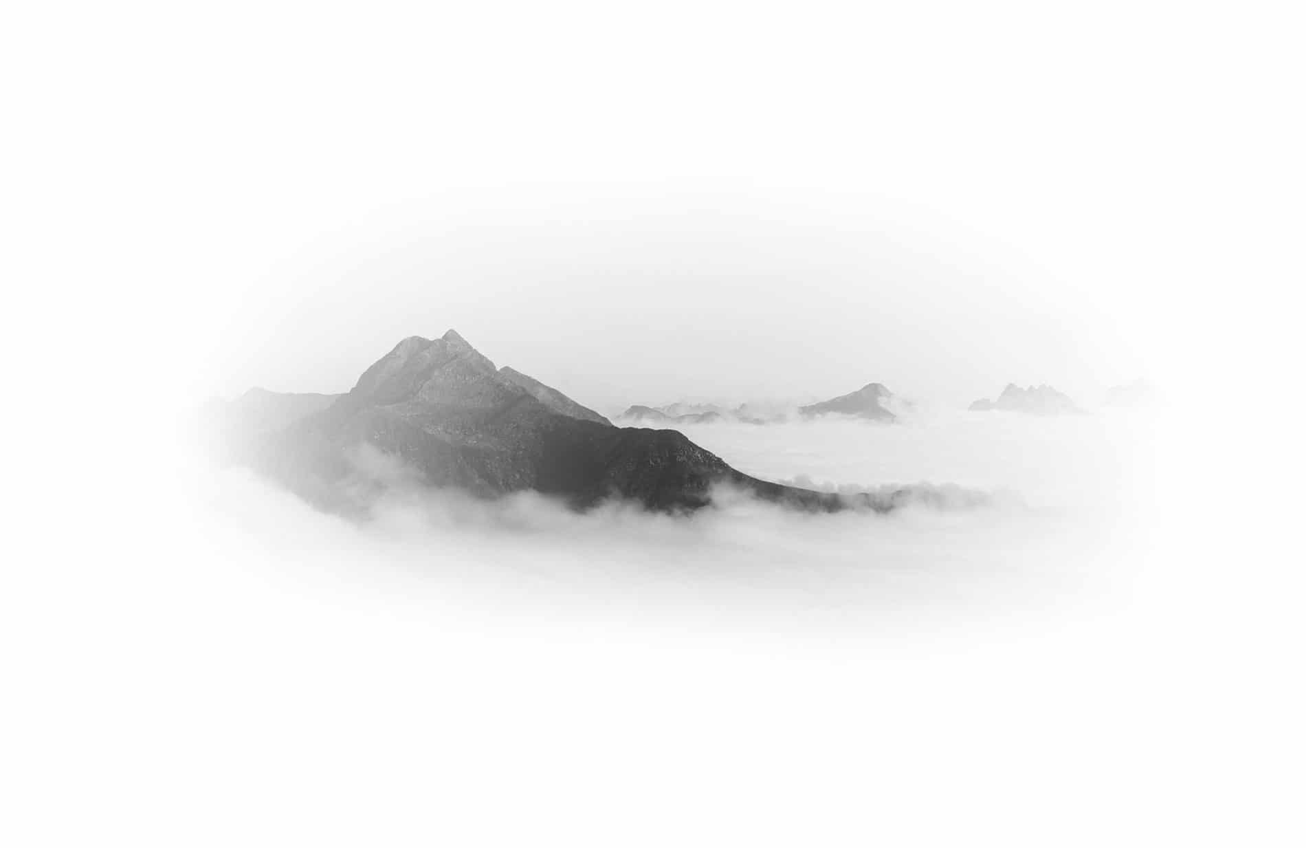 Mist drifting between mountain peaks